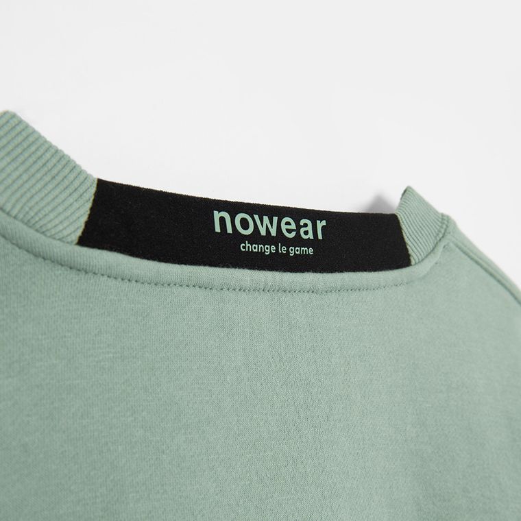 Miętowa bluza o kroju cropp NOWEAR